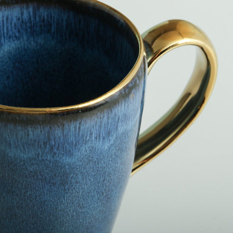 Senseo Mug in Blue featuring gold rim and handle