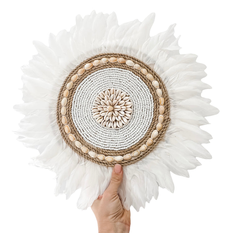 Beaded Sun Juju featuring shells, beads and feathers