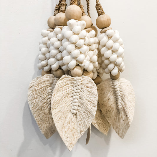 White Malibu Shell Tassel featuring cowrie shells