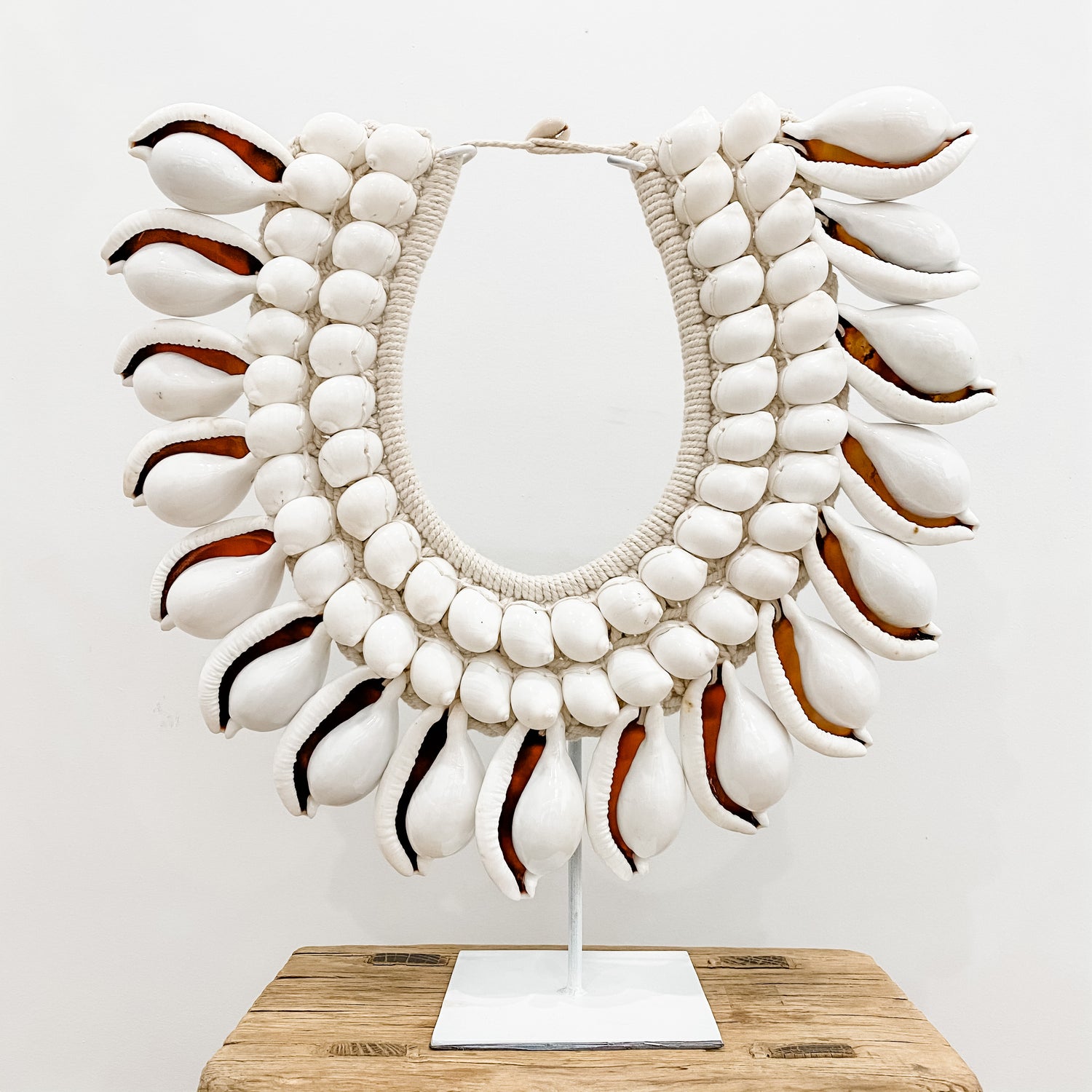 White Monsoon Shell Necklace on Stand