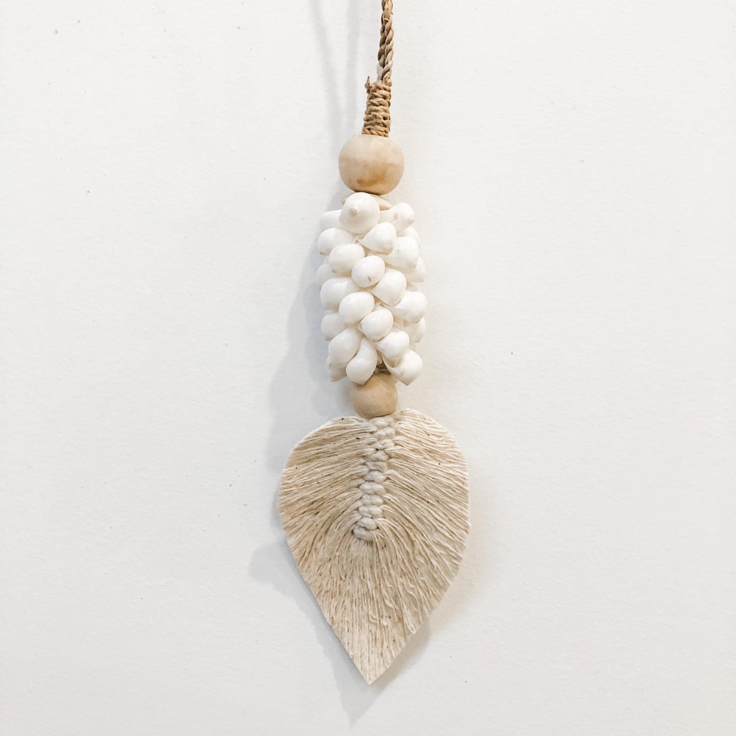 Malibu Shell Tassel featuring natural beads
