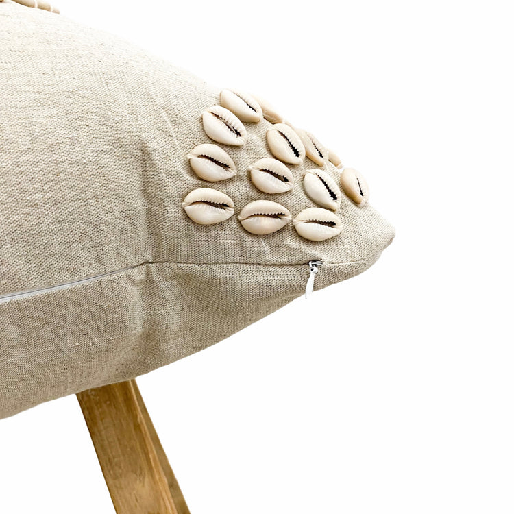 Natural Halo Cowrie Cushion featuring cowrie shells