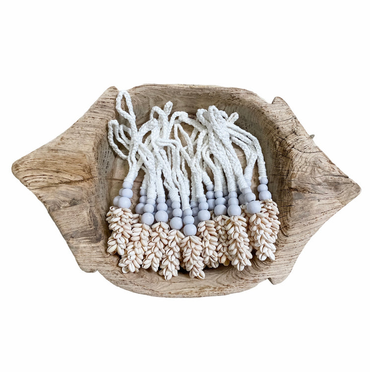 Oria Shell Tassel featuring white beads and cowrie shells